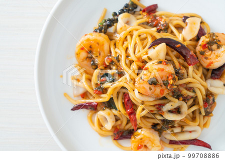 spicy spaghetti seafood on plate spicy spaghetti seafood on plate 99708886