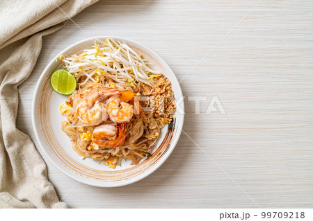 stir-fried noodles with shrimp and sprouts or Pad Thai stir-fried noodles with shrimp and sprouts or Pad Thai 99709218