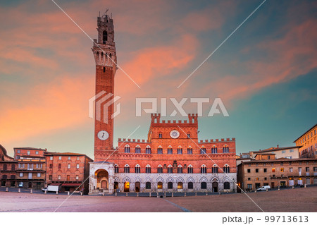 Siena, Italy - Piazza del Campo and the Mangia Tower, morning sunrise. Siena, Italy - Piazza del Campo and the Mangia Tower, morning sunrise. 99713613