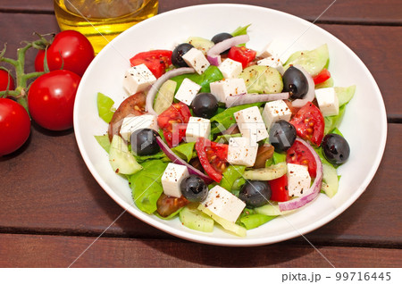 Greek salad with fresh vegetables closeup 99716445