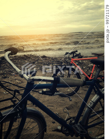 Bike on the beach side in the afternoon Bike on the beach side in the afternoon 99721179