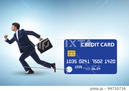 Businessman in the credit card debt concept 99730736