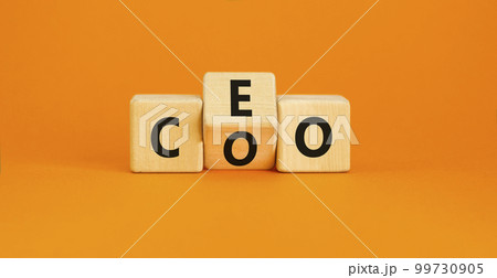 CEO or COO symbol. Concept word CEO chief executive officer or COO chieve operating officer on wooden cubes. Beautiful orange table orange background. Business and CEO or COO concept. Copy space. CEO or COO symbol. Concept word CEO chief executive officer or COO chieve operating officer on wooden cubes. Beautiful orange table orange background. Business and CEO or COO concept. Copy space. 99730905