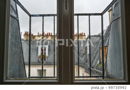 Conceptual image of a window on a rainy day Conceptual image of a window on a rainy day 99730992