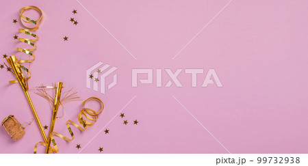 Festive background with golden serpentine, confetti and sparkles. Festive layout frame 99732938