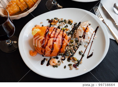Salad of smoked salmon with prawns, cream cheese, nuts and seeds 99738664