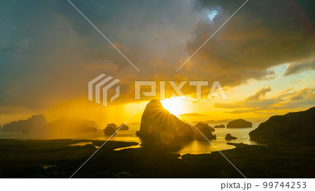 Sunrise mountain sea bay colorful sky with cloud before rainy 99744253