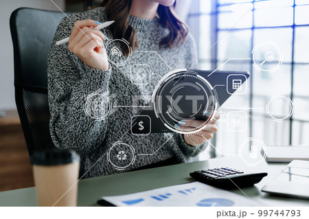 Digital marketing media in virtual screen.businesswoman hand working with mobile phone and modern compute with VR icon diagram at office in morning light 99744793