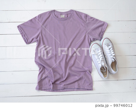 Purple T Shirt mockup weathered and canvas shoes on white wood background Purple T Shirt mockup weathered and canvas shoes on white wood background 99746012