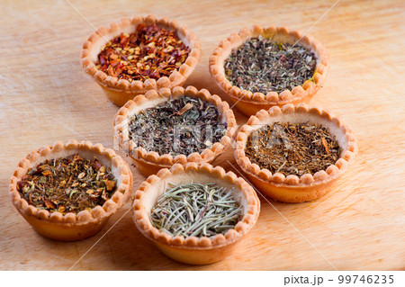 spices in bowls on table 99746235