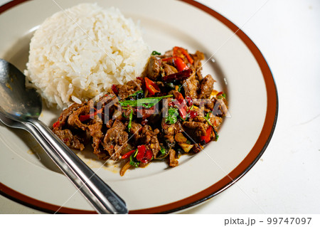 stir-fried basil with pork and fried egg stir-fried basil with pork and fried egg 99747097