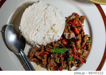 stir-fried basil with pork and fried egg stir-fried basil with pork and fried egg 99747112