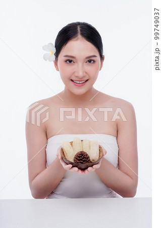 Beauty woman perfect face fresh clean skin portrait isolated on white. Beautiful asian girl with make up and beauty healthy skin color lips red and hair portrait. Spa and skin care concept. 99749037