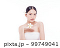 Beauty woman perfect face fresh clean skin portrait isolated on white. Beautiful asian girl holding plumeria flowers with make up and beauty healthy skin color lips red and hair portrait. Spa and skin 99749041