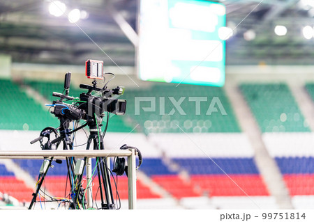 professional video camera broadcasting a football match professional video camera broadcasting a football match 99751814