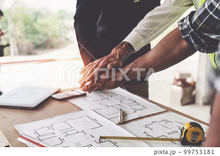 Foreman or Civil engineer put their hand to working together. industry professional team and engineer concept 99753181
