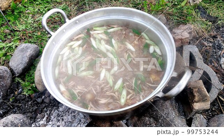 山形の秋を河原で味わう郷土の味… 芋煮 山形の秋を河原で味わう郷土の味… 芋煮 99753244