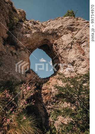 Landscape with Hole in Rock of Balkan Mountains 99754970