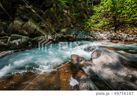 Blue Lagoon, mountain river among the rocks in the forest 99756167