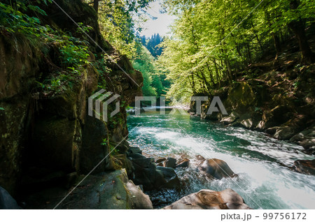 Blue Lagoon, mountain river among the rocks in the forest 99756172