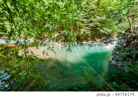 Blue Lagoon, mountain river among the rocks in the forest 99756174