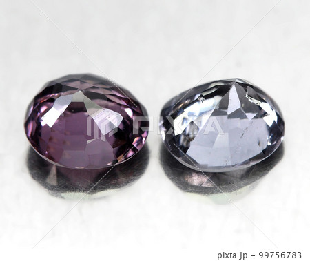Natural beautiful spinel gemstones on gray background Natural beautiful spinel gemstones on gray background 99756783