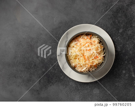 homemade fermented cabbage in a bowl. healthy vegan salad.  99760205