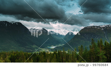 Byrkjelo Village, Sogn Og Fjordane County, Norway. Beautiful Sky Above Norwegian Rural Landscape. Bergheimsvatnet Lake In Summer Day. Agricultural And Weather Forecast Concept. 4k 99760684