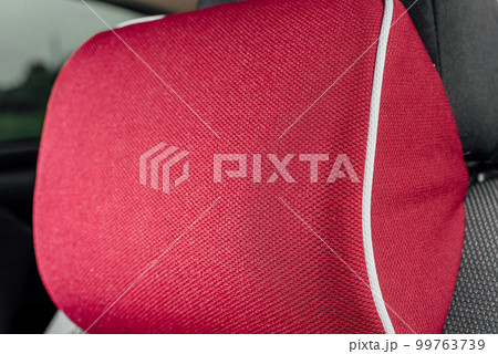 A soft pillow for the lower back and neck in the car A soft pillow for the lower back and neck in the car 99763739