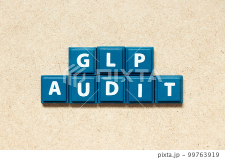 Tile alphabet letter in word GLP (Abbreviation of Good laboratory practice) audit on wood background Tile alphabet letter in word GLP (Abbreviation of Good laboratory practice) audit on wood background 99763919