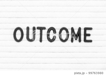 Black color letter in word outcome on white felt board background Black color letter in word outcome on white felt board background 99763980