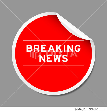 Red color peel sticker label with word breaking news on gray background 99764596