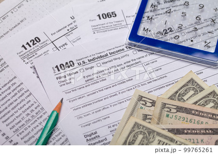 Income tax with instruction. Tax payment and filing concept Income tax with instruction. Tax payment and filing concept 99765261