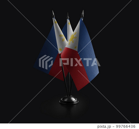 Small national flags of the Philippines on a black background 99766436