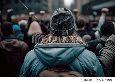 Back view of aggresive people protesting at city street. Protest activists. Crowd with raising fists.. Angry people make revolution. Created with Generative AI 99767409