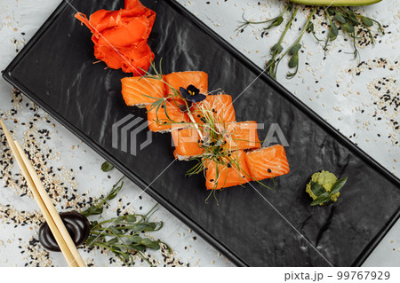 Sushi Philadelphia on a stone decorative plate Sushi Philadelphia on a stone decorative plate 99767929
