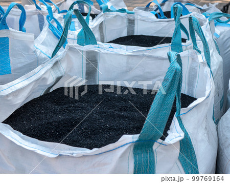 Black polystyrene granules in the big bags with handles. Construction and repair material 99769164