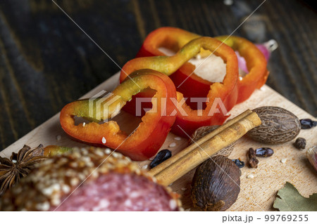 Sliced into pieces fresh ripe sweet pepper 99769255