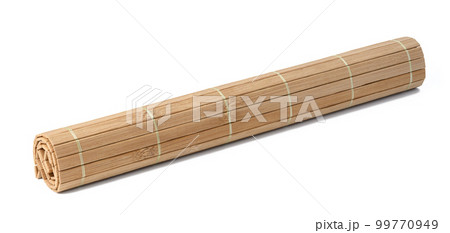 Twisted bamboo table mat on white isolated background, coaster for cups and plates Twisted bamboo table mat on white isolated background, coaster for cups and plates 99770949