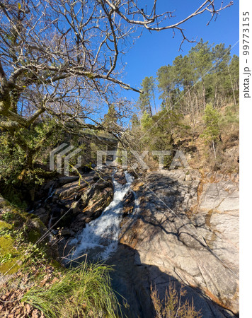 Water stream near Fecha de Barjas waterfall 99773155
