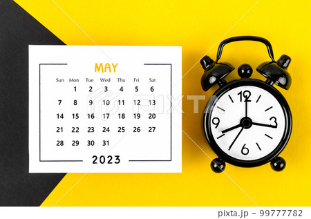 The May 2023 Monthly calendar for 2023 year with black colour alarm clock on beautiful background. The May 2023 Monthly calendar for 2023 year with black colour alarm clock on beautiful background. 99777782