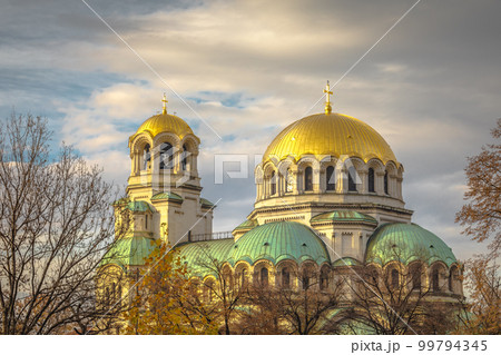 Alexander Nevski cathedral square in Sofia at dramatic autumn sunset, Bulgaria 99794345