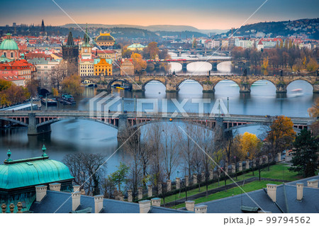 Panoramic view over the cityscape of Prague at dramatic dusk, Czech Republic 99794562