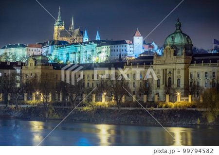 Panoramic view over the cityscape of Prague at dramatic dusk, Czech Republic 99794582