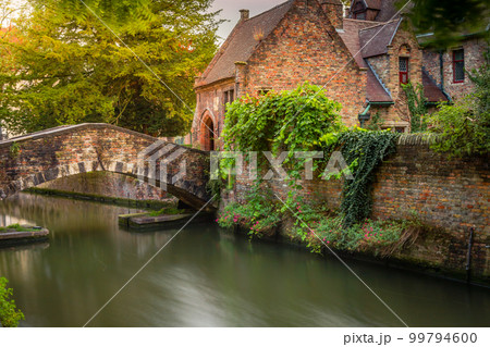 Flemish and ornate architecture of idyllic Bruges with canal, Flanders, Belgium 99794600