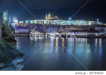 Panoramic view over the cityscape of Prague at dramatic dusk, Czech Republic Panoramic view over the cityscape of Prague at dramatic dusk, Czech Republic 99794820
