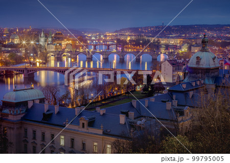 Panoramic view over the cityscape of Prague at dramatic dusk, Czech Republic 99795005
