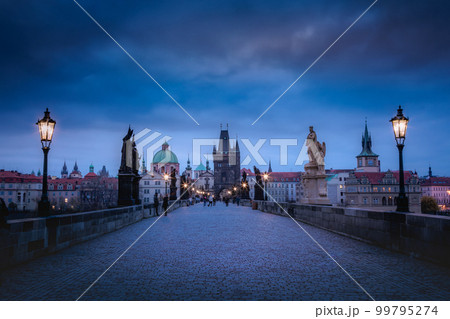 Charles Bridge, Prague at dramatic evening, Czech Republic, with night lighting 99795274
