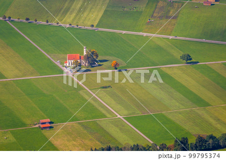 St. Coleman's Church in idyllic Bavarian alps meadows, Schwangau, Germany St. Coleman's Church in idyllic Bavarian alps meadows, Schwangau, Germany 99795374