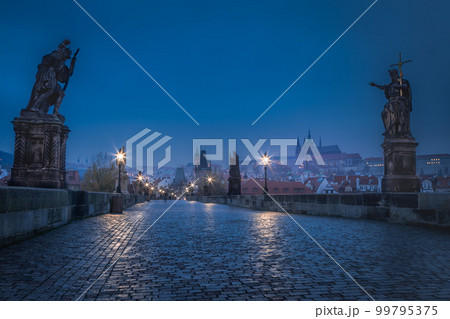 Charles Bridge, Prague at dramatic evening, Czech Republic, with night lighting Charles Bridge, Prague at dramatic evening, Czech Republic, with night lighting 99795375